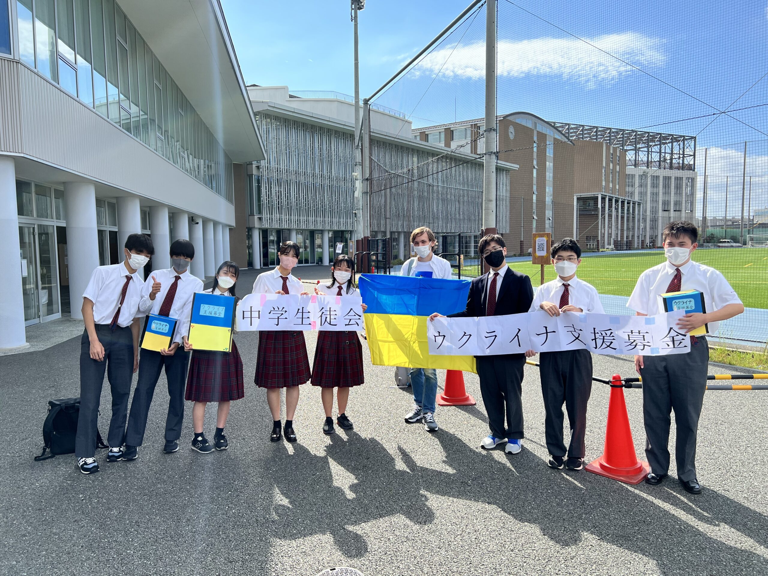 Junior High School Students collecting money to help Ukrainian people
